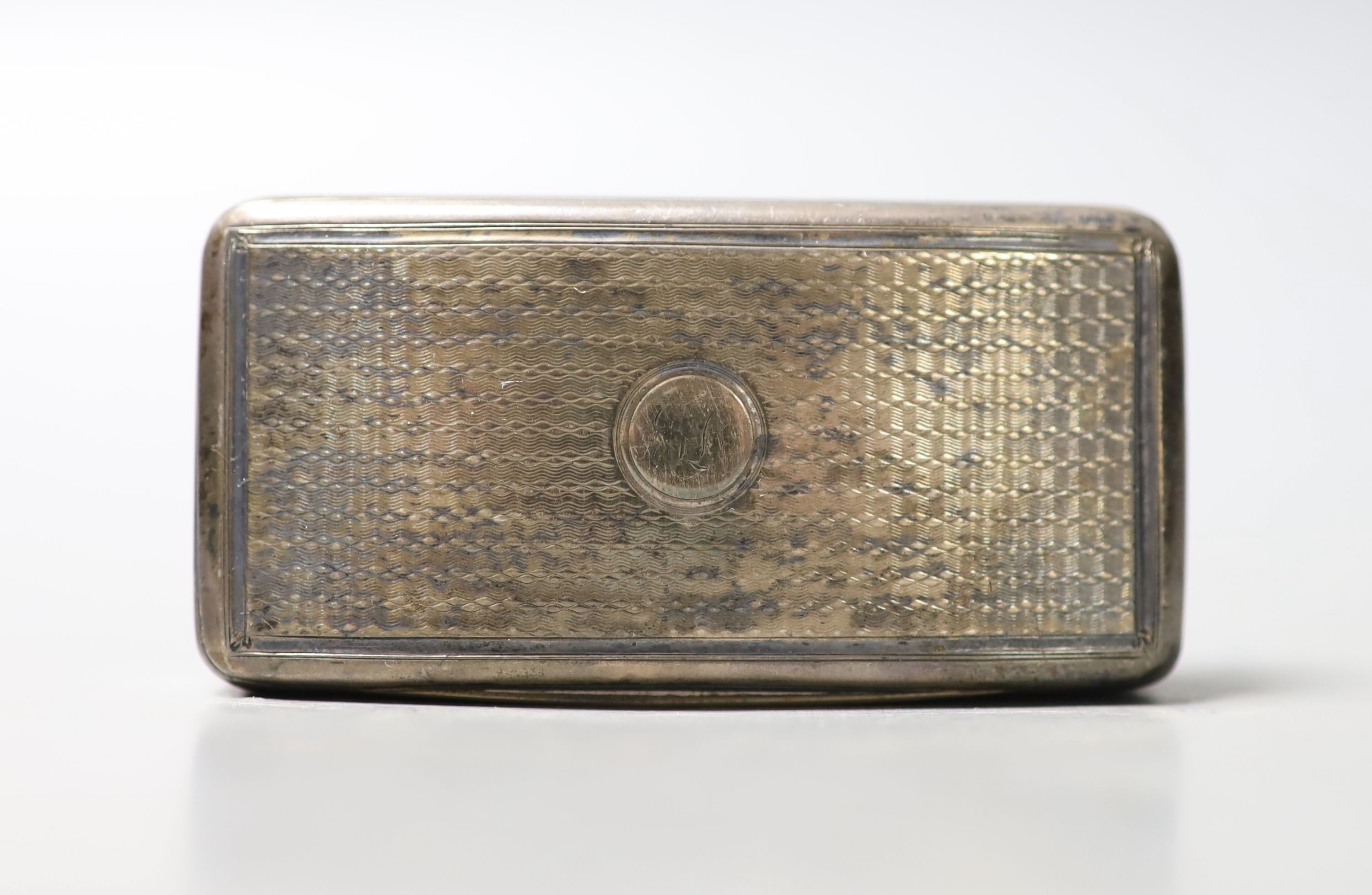 A George III engine turned silver concave snuff box, William Eaton, London, 1814, 79mm.